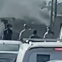 Smoke billows during a reported settler attack in the Palestinian West Bank village of Yabrud, October 13, 2025. (Screen capture: X/Palestinian Information Center)